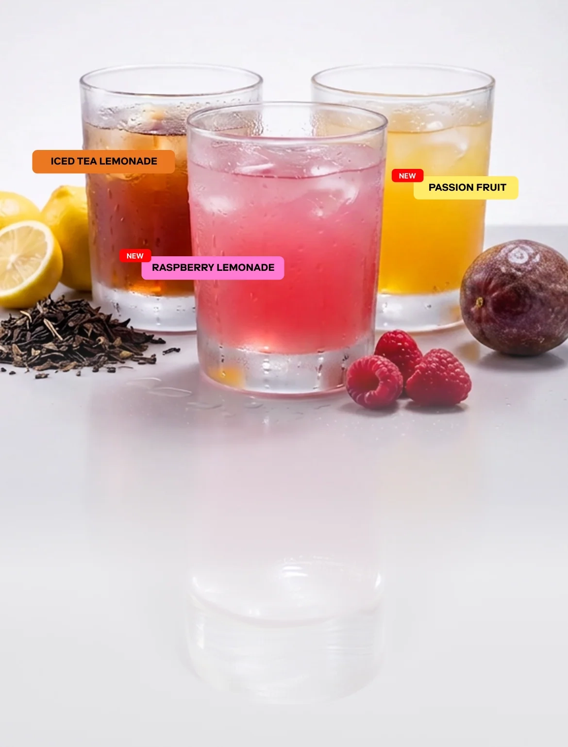 Three glasses of magna creatine flavors with fruit and tea leaves